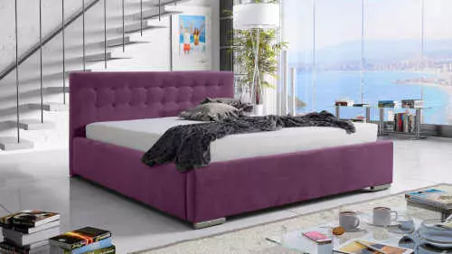 Čalúnená posteľ v pohodlnom dizajne